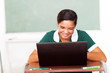 high school student using laptop