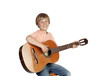 Smiling boy with a guitar