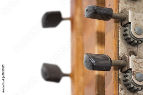 Photo: old wooden guitar on a white background old wooden guitar on a white background