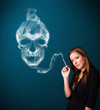 Young woman smoking dangerous cigarette with toxic skull smoke