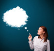 Young woman smoking unhealthy cigarette with dense smoke