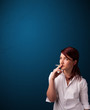 Beautiful woman smoking cigarette vith copy space
