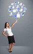 Photo: Pretty woman holding social icon balloon Pretty woman holding social icon balloon