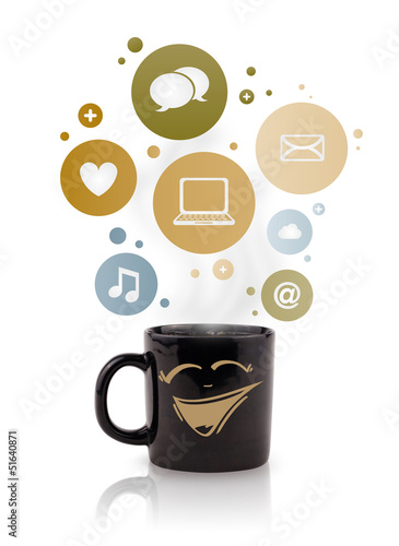 Photo: Coffee cup with social and media icons in colorful bubbles Coffee cup with social and media icons in colorful bubbles