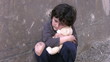 Homeless poor little boy