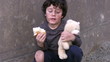Homeless poor little boy