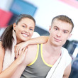 Photo: Man and woman drinking water after sports Man and woman drinking water after sports