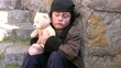 Homeless poor little boy