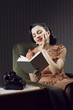 Foto: Young woman daydreaming Young woman daydreaming
