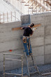 Carpenter at work on building yard