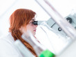 student under microscope analysis