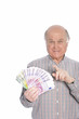 Successful senior man with banknotes