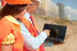  architects  works in front of building site