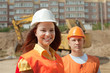 Portrait of two builders