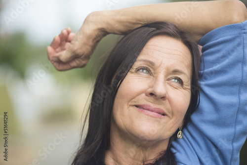 Photo: Happy smiling relaxed mature woman Happy smiling relaxed mature woman