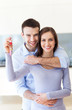 New home owners with key