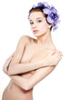 fashion model with  orchid  flowers in her hair.