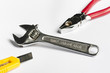 Single wrench with pliers and a stanley knife