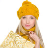 Smiling girl in autumn clothes with shopping bag