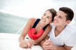 Couple sailing on a boat