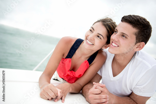 Photo: Couple sailing on a boat Couple sailing on a boat