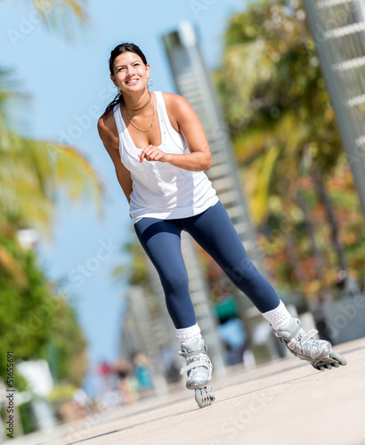 Photo: Woman skating outdoors Woman skating outdoors