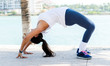 Fit woman stretching outdoors