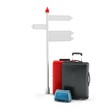 3d pile of luggage by a sign
