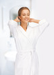beautiful woman in white bathrobe