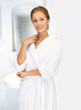 beautiful woman in white bathrobe