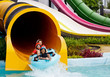 Boy playing in water park