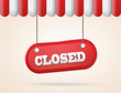 shop roof with closed red sign