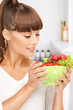woman in the kitchen with tomatoes