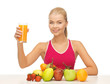 young woman with glass of orange juice