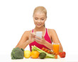 woman with fruits, vegetables and smartphone