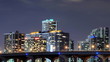 Time lapse of urban scene at night with buildings and traffic