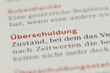 Überschuldung Überschrift Definition in einem Buch