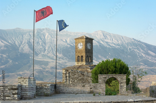 Clock Tower and Albanian Flag on the Gjirokaster Castle, Albania