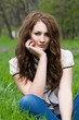 girl sitting in the grass