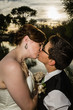 Photo: Kissing Married Couple by Lake Kissing Married Couple by Lake