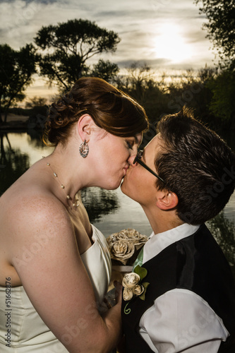 Photo: Kissing Married Couple by Lake Kissing Married Couple by Lake