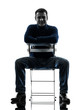 Photo: man sitting smiling looking at camera silhouette full length man sitting smiling looking at camera silhouette full length