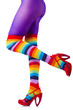 Woman legs in colourful stockings on white
