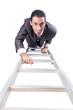 Businessman climbing the ladder isolated on white
