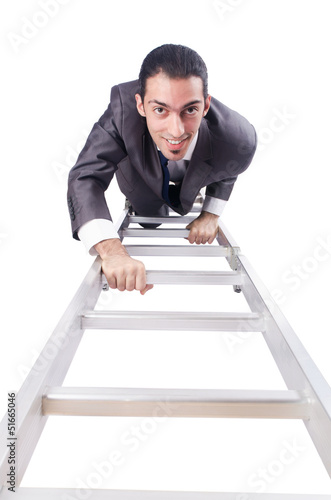 Photo: Businessman climbing the ladder isolated on white Businessman climbing the ladder isolated on white