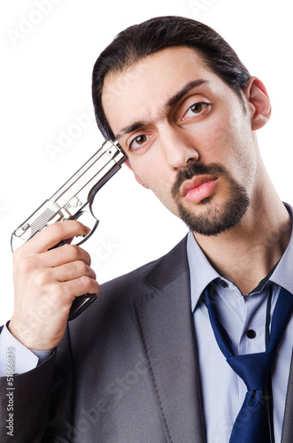 Photo: Businessman committing suicide isolated on white Businessman committing suicide isolated on white