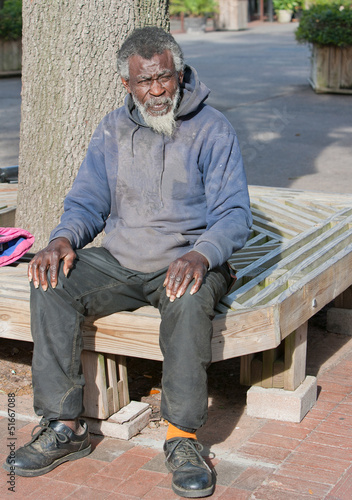 Photo: Poor old African american homeless man Poor old African american homeless man