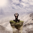 Happy businesswoman meditate in mountain