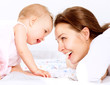 Foto: Mother and Baby. Happy Family Mother and Baby. Happy Family