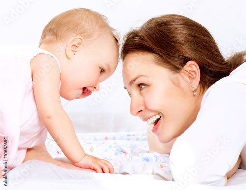 Photo: Mother and Baby. Happy Family Mother and Baby. Happy Family